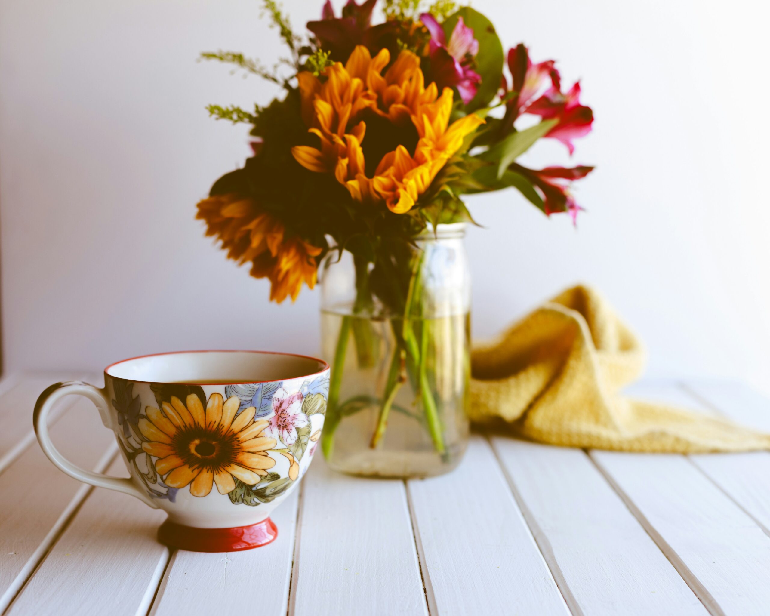 still life made of flowers and a tea cup